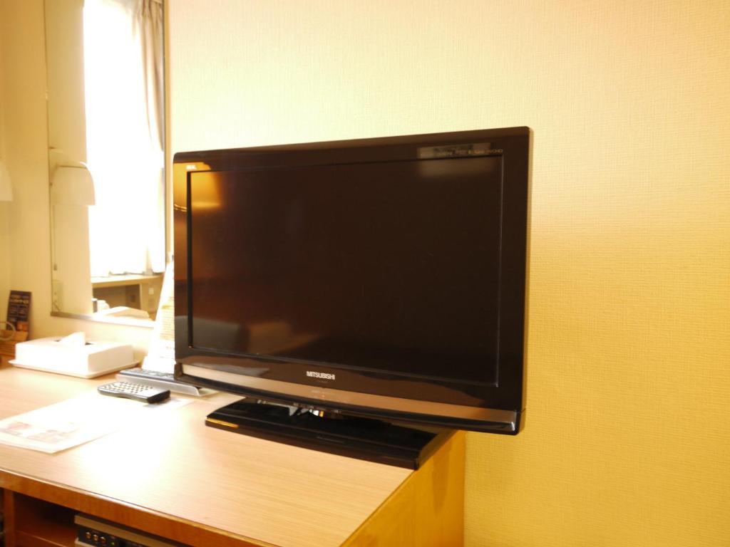 Hotel Route-Inn Hofu Ekimae Номер фото